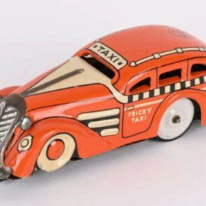 Vintage Tricky Taxi Tin Car